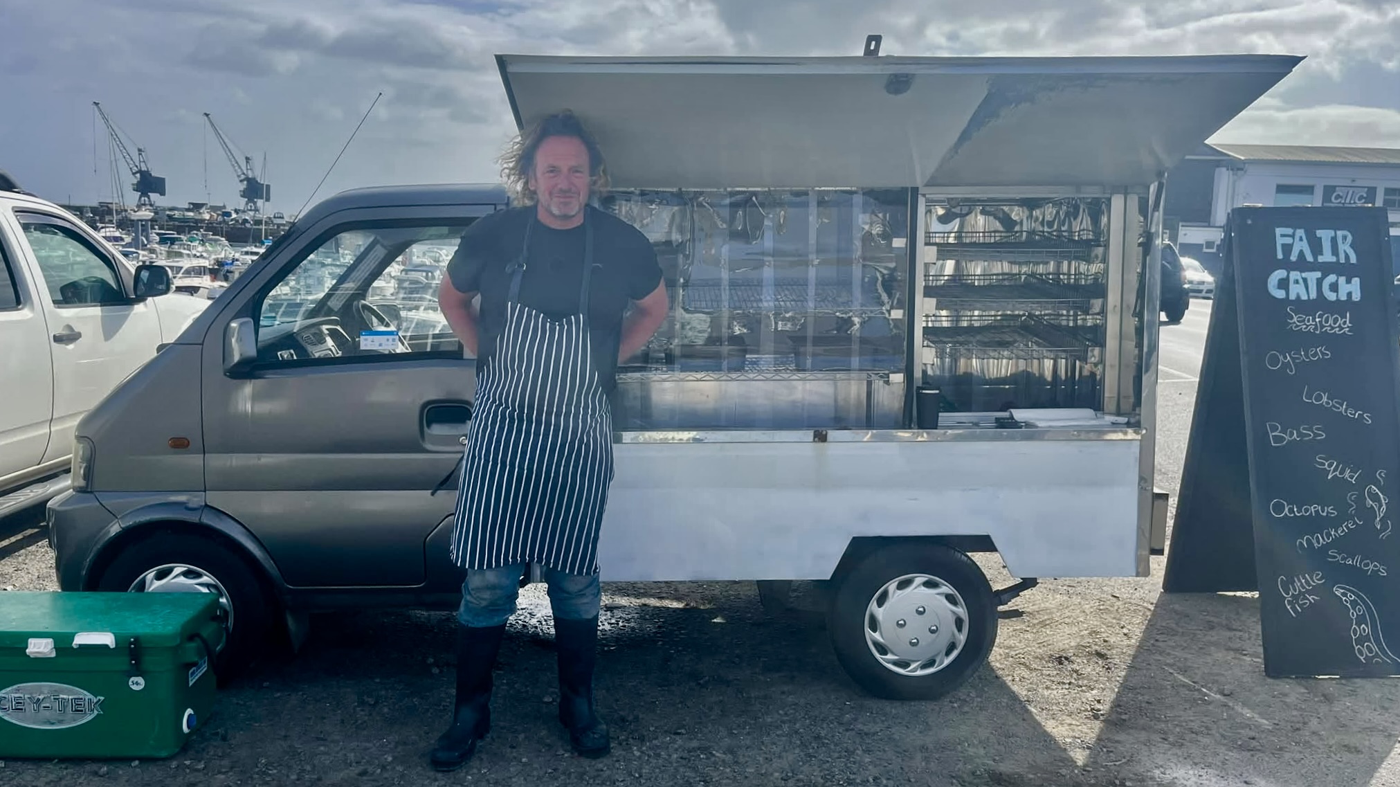 Justin de Carteret standing beside the Fair Catch seafood van